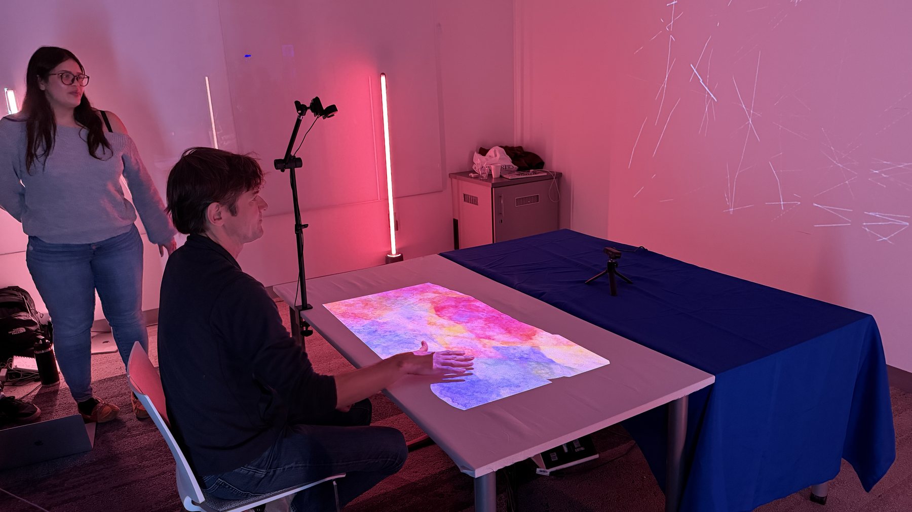 Table and wall projection setup during Project Projection Showcase Day